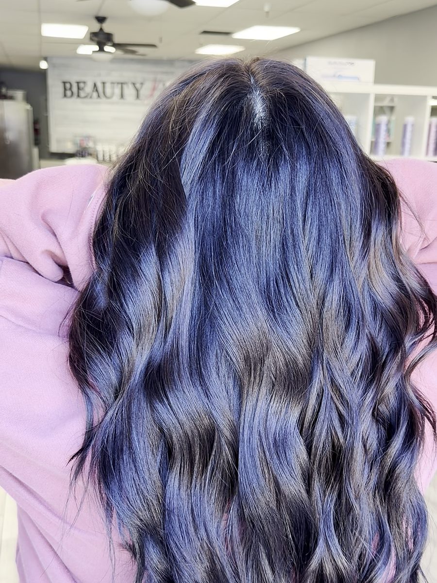 Long wavy black hair with blue tones