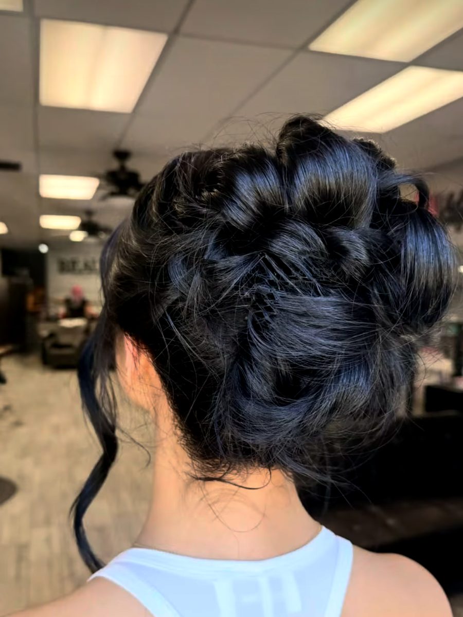 Textured braided updo on dark hair